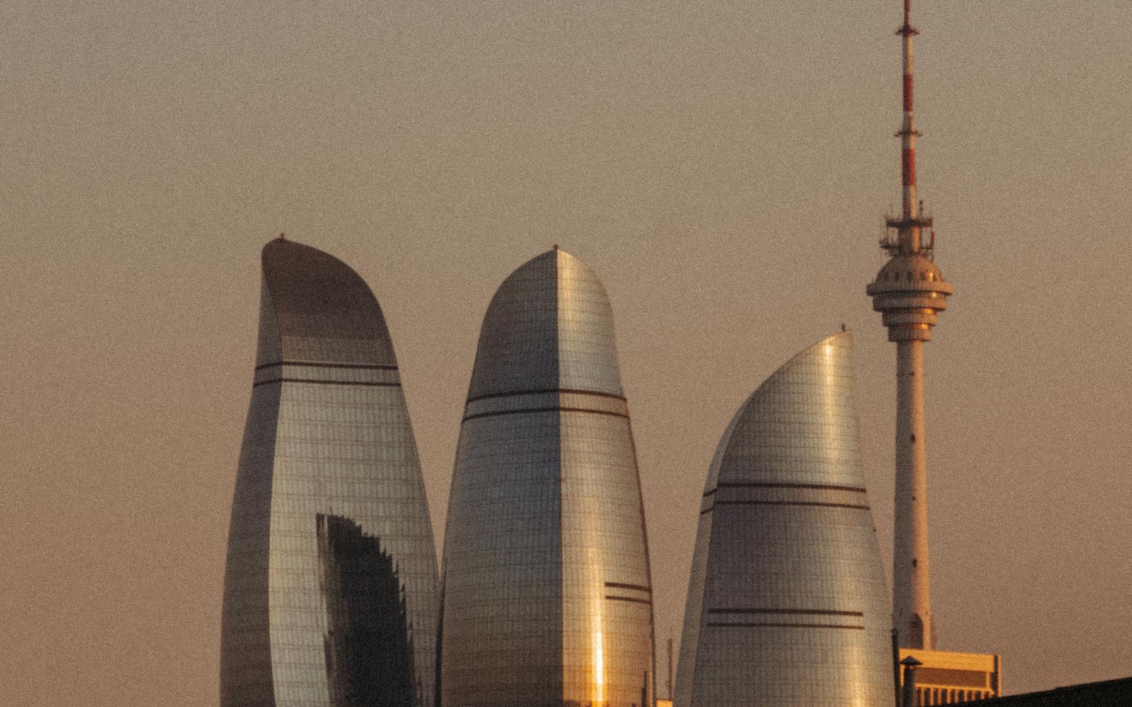 Baku's Flame Towers and skyline at sunset, Azerbaijan